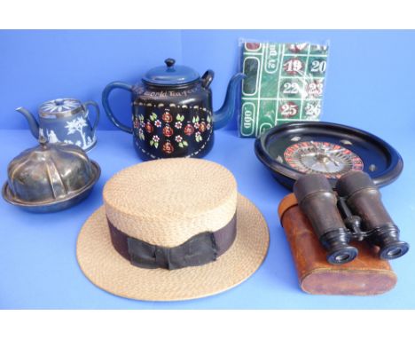 A selection to include:a painted enamel bargeware-style teapot;a heavy early 20th century French ebonised wood roulette wheel