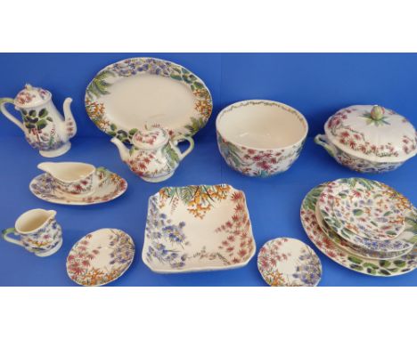 A Gien 'Tamarin' 50-piece dinner service:8 x 29 cm plates;9 x 23 cm plates;9 x 16.5 cm plates; 9 x 23 cm soup plates; 1 x gra