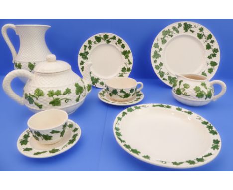 A 97-piece Bordallo Pinheiro dinner service:10 x 26 cm plates;45 x 20.5 cm plates;15 x 20.7 cm soup plates;2 x teapots, 8 x t