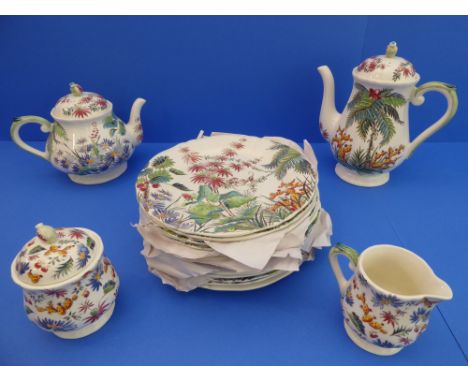 A Gien 'Tamarin' 17-piece&nbsp;tea and coffee service: teapot and coffee pot; milk jug and sugar; 13 x 23 cm plates. (Chip to