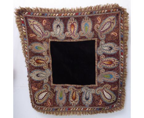 A fine late 19th/early 20th century hand-stitched tablecloth: dark velvet centre surrounded by a highly ornate border with va