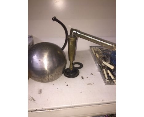 A metal globe and an Ebullioscope. 