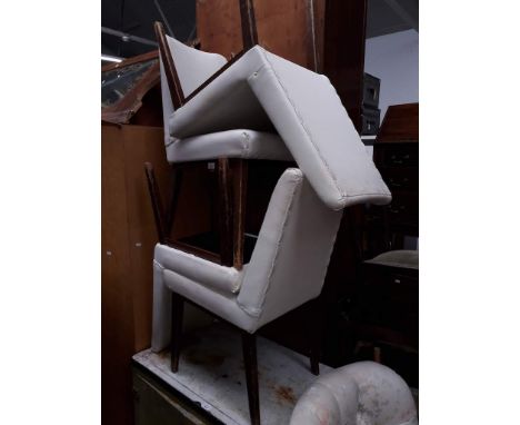 A set of four retro upholstered chairs and a button back nursing chair. 
