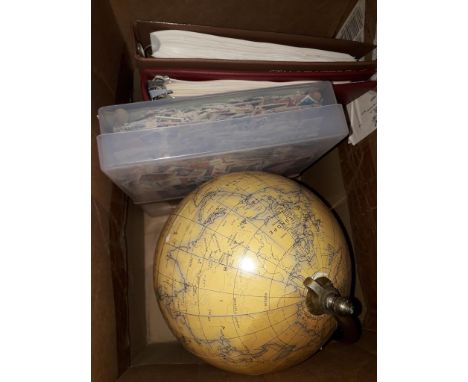 A box of stamps and a terrestrial globe, inc 2 albums, one with GB QEII onwards, the other is World stamps inc GB George V an