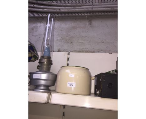 Oil lamp, enamel pan and box camera 