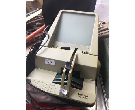 A vintage Hahnel slide projector and viewer 