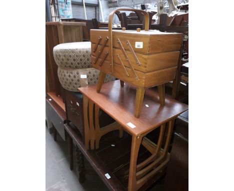 Four items of vintage furniture comprising a concertina sewing box, a light wood nest of tables, an upholstered stool and a p