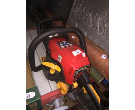 A Home Lite petrol chain saw 33cc engine 