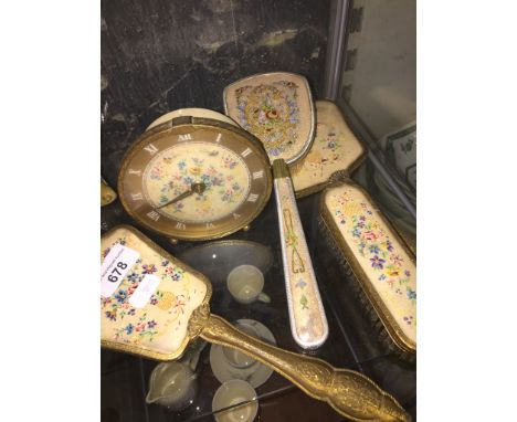 Dressing table set including a clock 