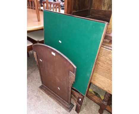 A green baize top folding card table and a wooden fire screen. 