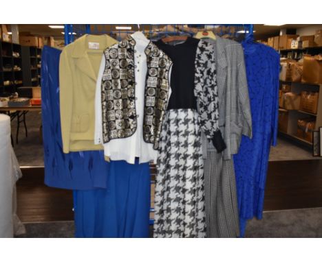 A mixed collection of vintage and retro ladies clothing, including wool suit and Tina Warren maxi dress.