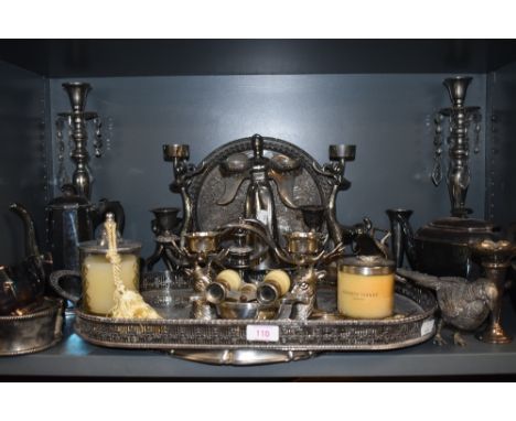 A variety of mixed vintage and modern plated wares, included are candle stick holders, trays, tea pots and a set of opera gla