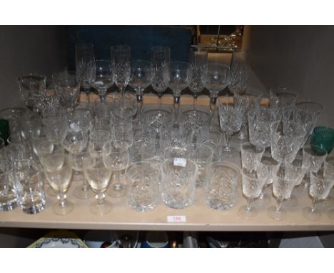 A large quantity of vintage cut and etched glasses, various styles and sizes.