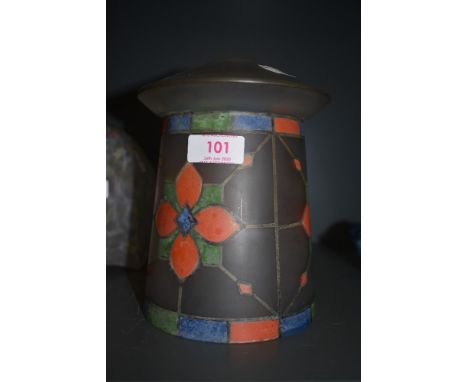 An unusually shaped glass lamp shade having art deco styling and red, blue and green detailing.
Condition Report No chips or 