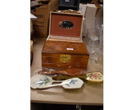 A selection of dressing table items including two jewellery cases and HM silver and enamel decorated brush and mirror set
