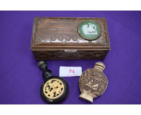 A copper box containing a vintage orietal snuff bottle and a scent bottle.
Condition Report No makers marks&nbsp;