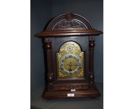 A traditional bracket clock having 18cm German movement with Westminster chime in stained case, height approx. 48cm