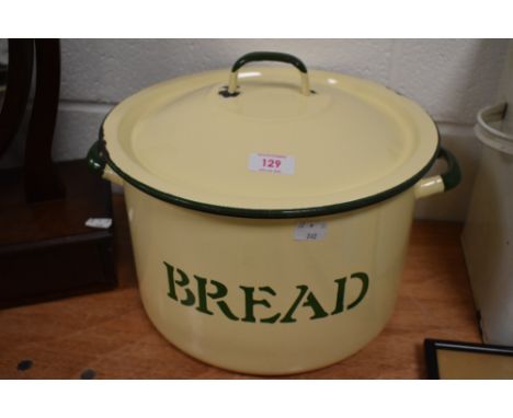 Vintage enamel bread bin in cream and green.
In good condition