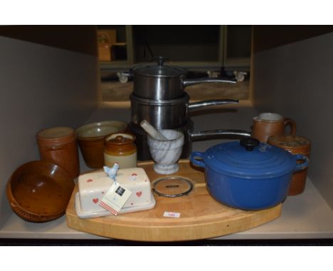 A selection of vintage earthen ware including jugs, containers and bowls. Also pans, a Le Creuset two handled pan and an AGA 