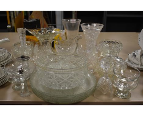 An array of vintage glass ware,including cut,pressed and etched, amongst are bowls, vases ,jugs and more.