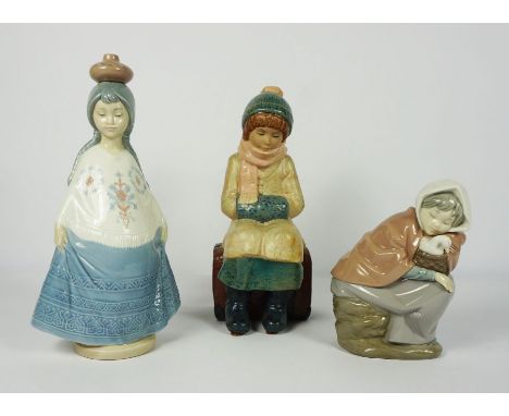 Nadal Glazed Pottery Figure, Modelled as a girl wearing a hat and scarve, With two Nao Figures of Girls, 17cm, 27cm, 30cm hig