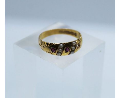 Victorian 15ct Gold Ruby and Seed Pearl Gypsy Ring, Stamped for Birmingham 1893, Set with three small rubies, Interspersed wi