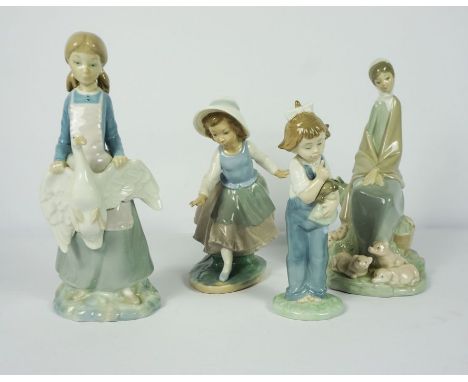 Four Nao Figures, Modelled as girl groups, 19cm, 20cm, 25cm, 26cm high (4)
