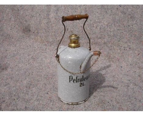 A 2-litre engine priming tap filling kettle in granite pattern enamel, French, circa 1896 with original spout cap and chain.