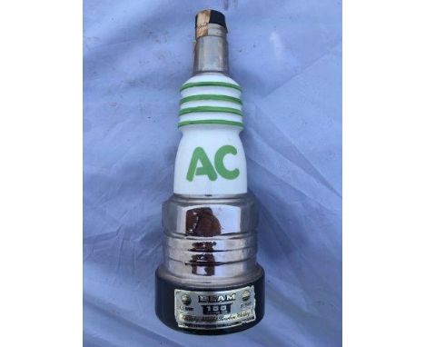An AC Plug ceramic decanter containing Jim Beam.