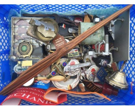 A quantity of assorted motoring collectables to include enamel keyrings, badges etc. 