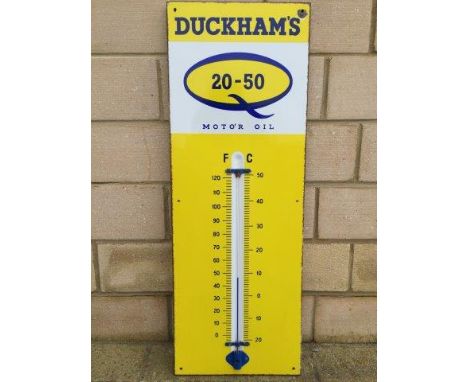 A Duckhams 20/50 Motor Oil enamel thermometer by repute in working original condition, 13 x 36".