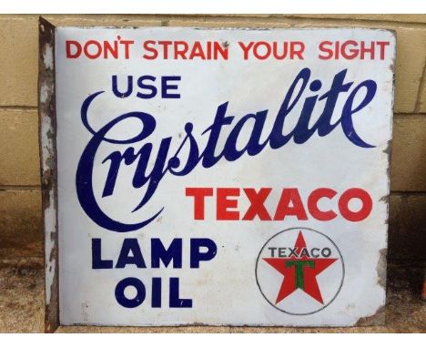 A rare Texaco Crystalite Lamp Oil double sided enamel sign with hanging flange, with some retouching, 22 1/2 x 20".