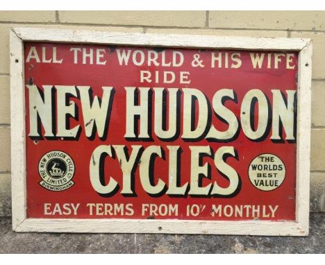 A New Hudson Cycles rectangular enamel sign, set within a painted wooden frame, some retouching and varnished, 35 3/4 x 24 1/