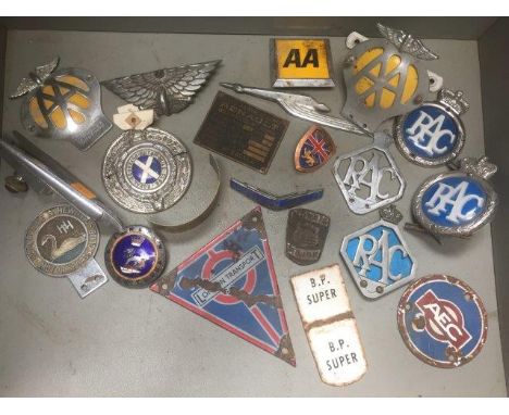 A collecion of assorted car badges and insignia; also enamel plaques for London Transport, AEC etc. 
