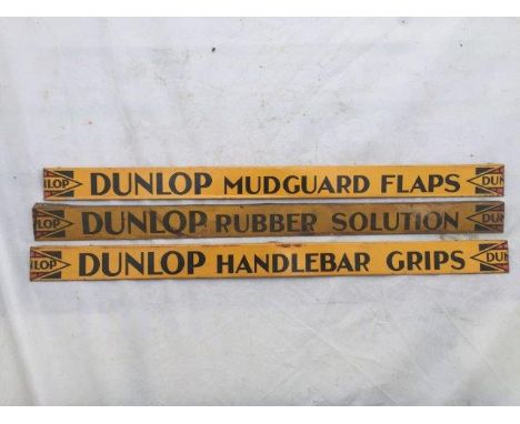 Three Dunlop shelf strips for handlebar grips, rubber solution and mudguard flaps.