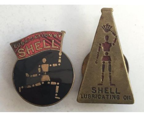A Shell Lubricating Oil 'robotman' lapel badge and another 'robotman' black and red enamel badge. 