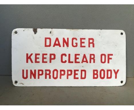 A small enamel sign - 'Danger Keep Clear of Unpropped Body', 10 x 5".