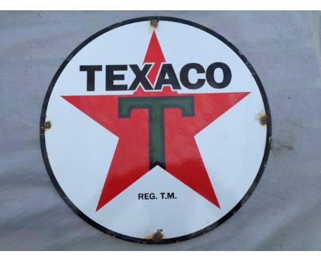 A small circular Texaco enamel sign in good condition, 15" diameter.