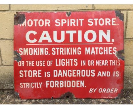 A Motor Spirit Store 'Caution' rectangular enamel sign by Bruton of Palmers Green, 23 1/2 x 19"