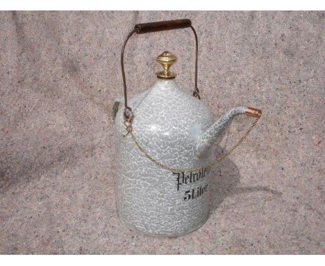 A 5-litre decorative French petrol container with original spout and filling cap in raindrop pattern stove enamel.