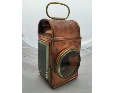 A Vacuum Oil Company copper cart lamp. 