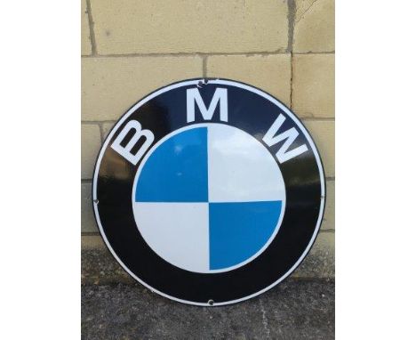A BMW circular convex dealership enamel sign, 24" diameter.