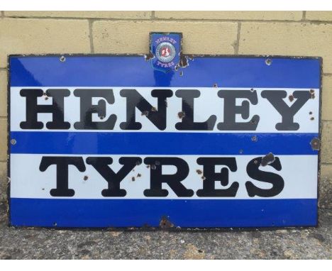 An unusual Henley Tyres rectangular enamel sign with raised Henley Tyres pediment showing a tyre, by Bruton of Palmers Green,