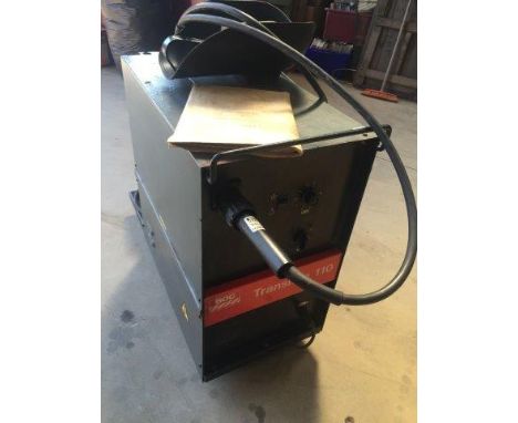 A Transmig 110 welder with mask and spanner etc. 
