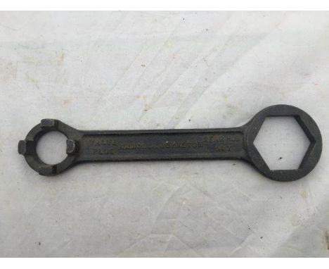 An Arrol Johnston rear hub nut spanner with valve plug spanner to the other end.