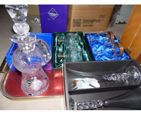 An Edinburgh Crystal decanter; a pair of gilt rim goblets; similar sets