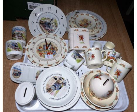 A collection of Royal Doulton Bunnykins nursery china; a similar clock; a Thomas the Tank Engine clock