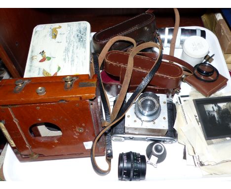 A mahogany plate camera by Lancaster (a.f.); a quantity of railway photographs; glass slides; etc.
