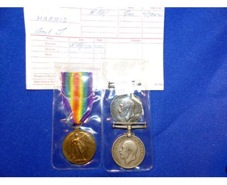 A WWI war medal to 020951 2.Cpl H. Slater, A.O.C. (renamed); another to 25309 Pte G.W. Smith R.Lanc R.; and a Victory medal t