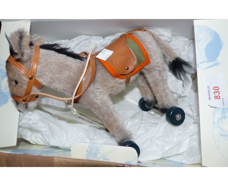 A modern Steiff replica:  "Esel auf Raedern 1929", with certificate, in original box